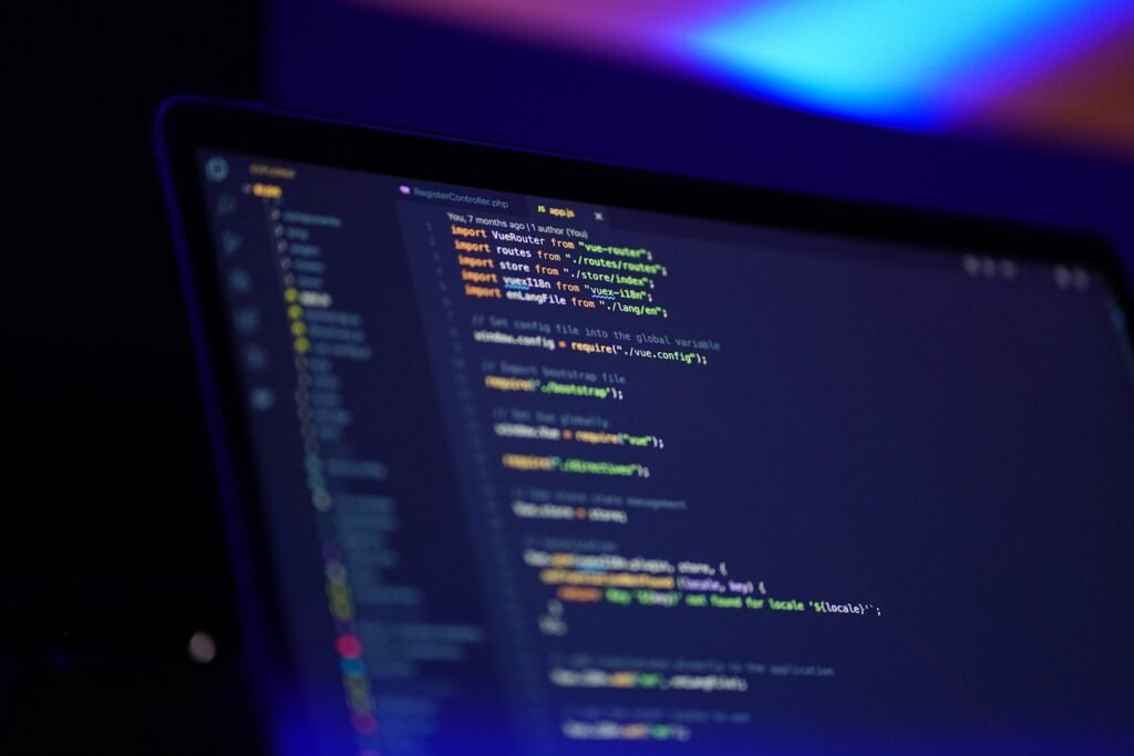 Laptop screen displaying website code