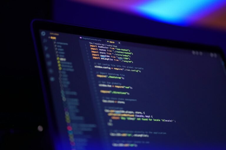 Laptop screen displaying website code